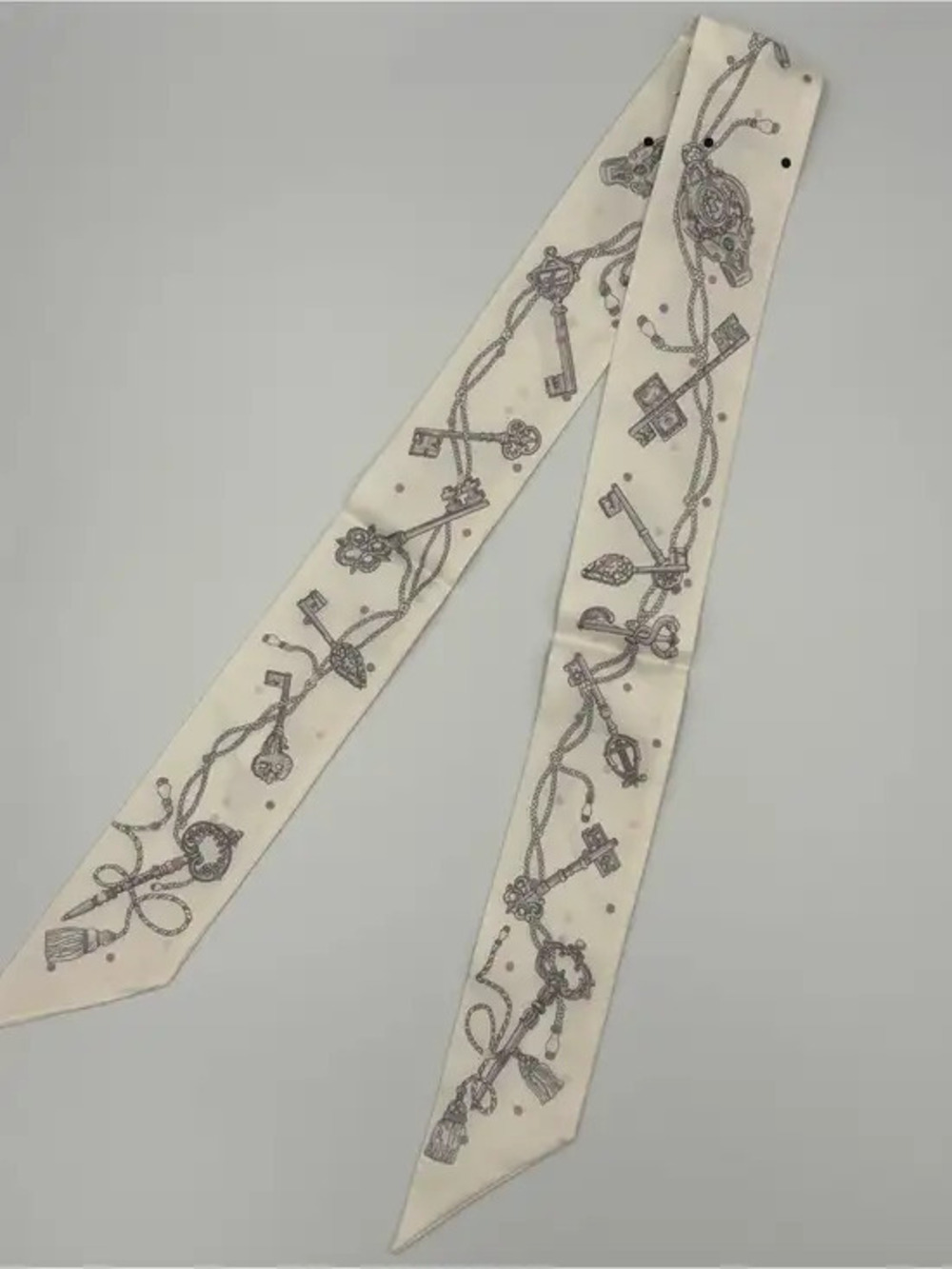 Hermes Twilly 100% Silk Antique Keys Print Bag Tie Scarf